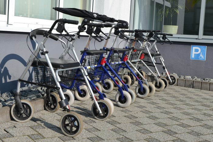 Walking aids for elderly include rollators like those pictured.